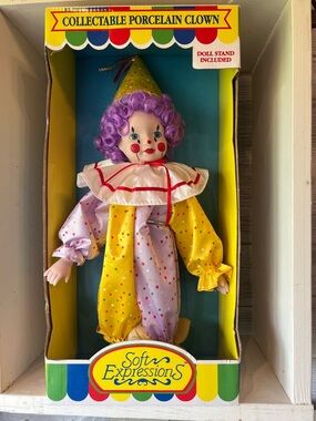 Expressions Collectable Porcelain Clown Doll with Purple Hair and Yellow Outfit